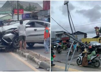 Mobil tabrak tiang lampu jalan