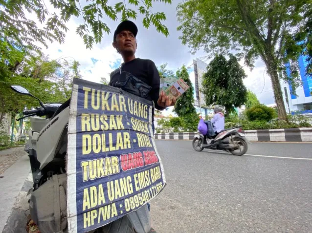 Jasa Penukaran uang ditertibkan