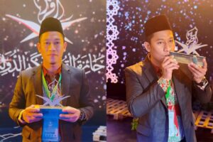 Imrannul Karim terima piala atas pencapaiannya di ajang MTQ Internasional 2026